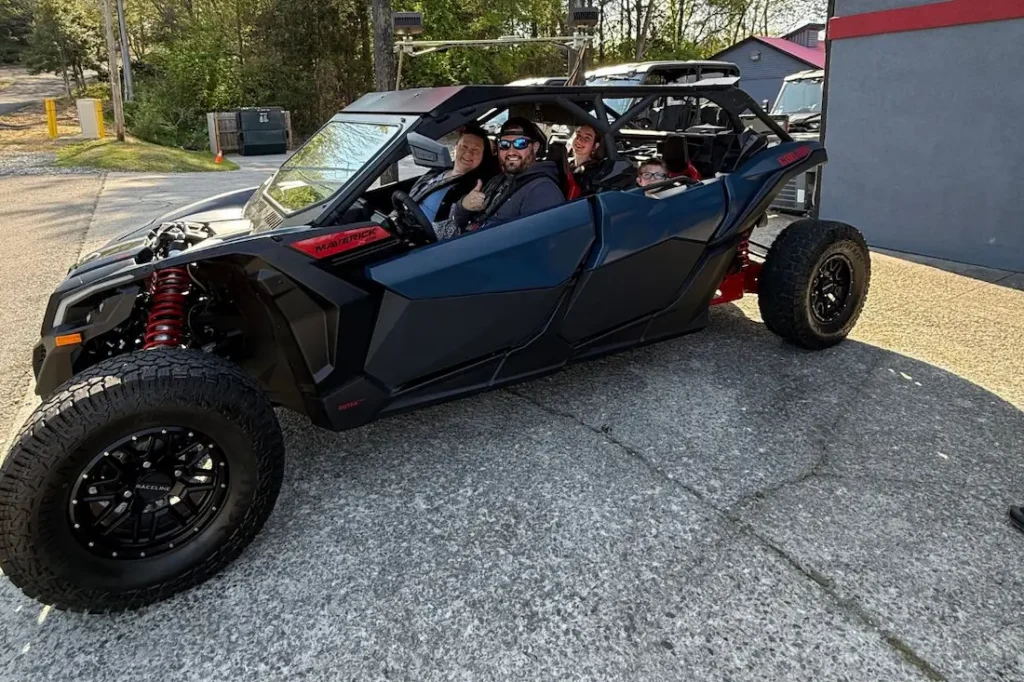 Family ready for a UTV rental at Smoky Mountain Adventure Rides in Pigeon Forge TN